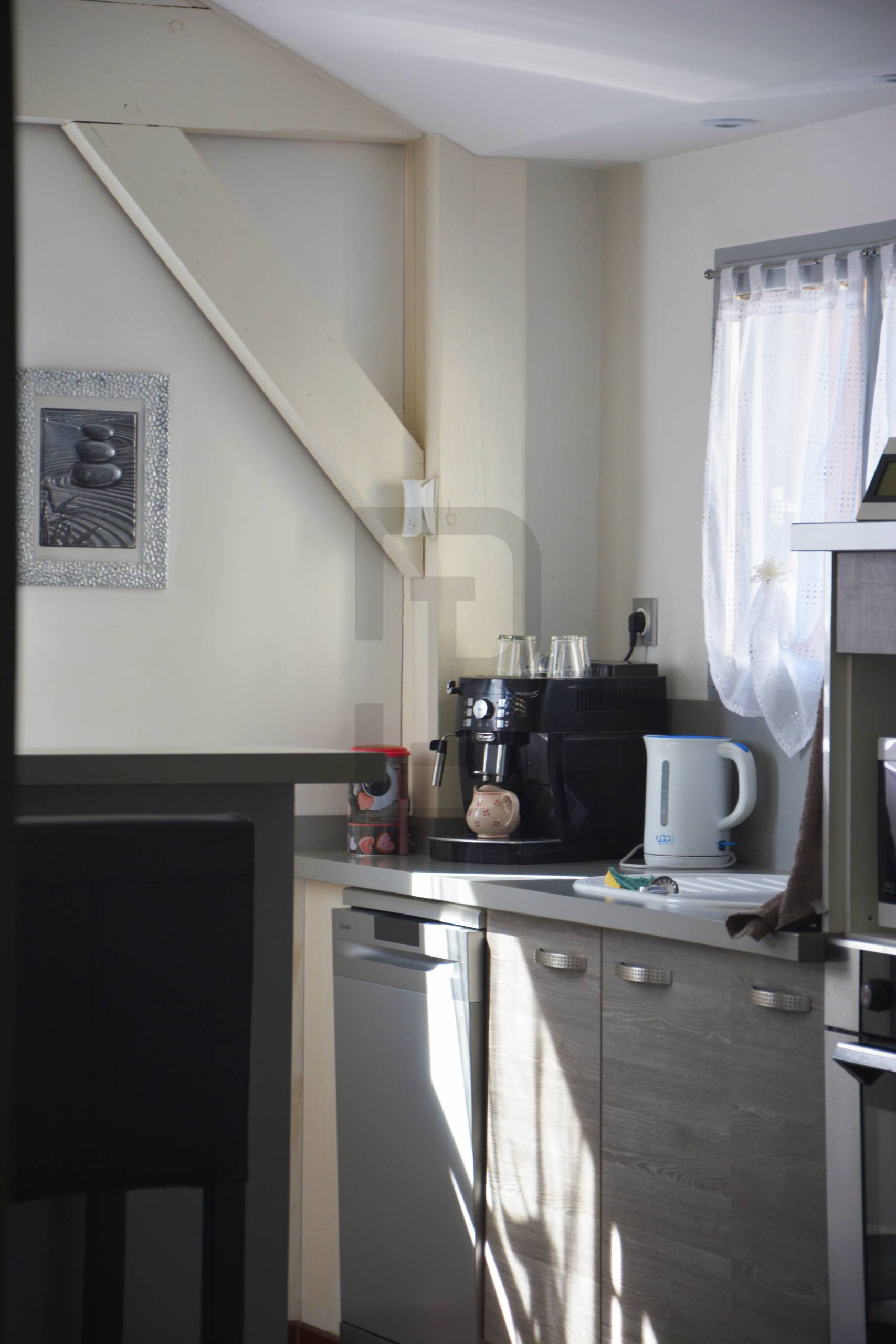 Ensemble immobilier à Quillan, composé de 2 logements (une maison avec un garage + un studio indépendant avec terrasse).