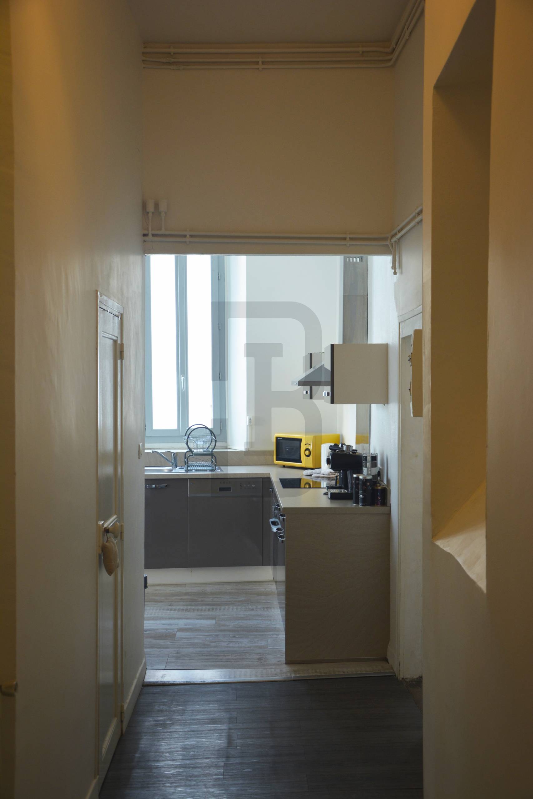 Appartement lumineux au première étage composé de deux chambres au coeur du centre ville de LIMOUX.